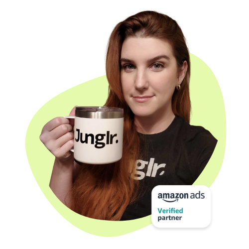 Elizabeth Greene, co-founder of Junglr, holding a Junglr mug